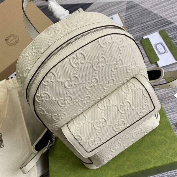 GUCCI LOGO EMBOSSED PERFORATED LEATHER BACKPACK - GC54